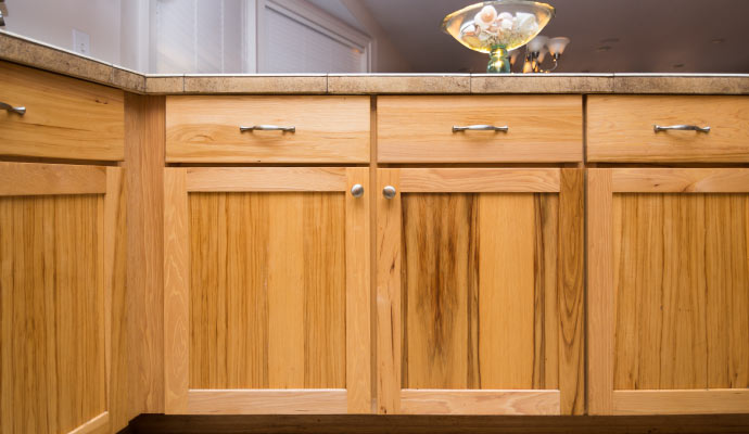 A stained kitchen cabinet