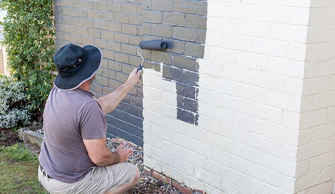 Painting exterior brick walls