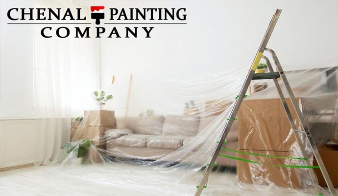 Interior painting project with upholstery covered by poly